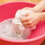 Is hand washing clothes effective?