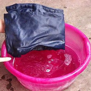 Wash with hot soapy water