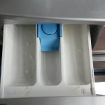 Why does my washing powder clump in drawer?
