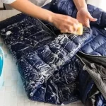 Why is down jacket washing better than dry cleaning?