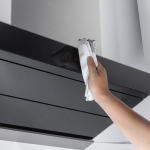 How to clean grease off wood range hood?